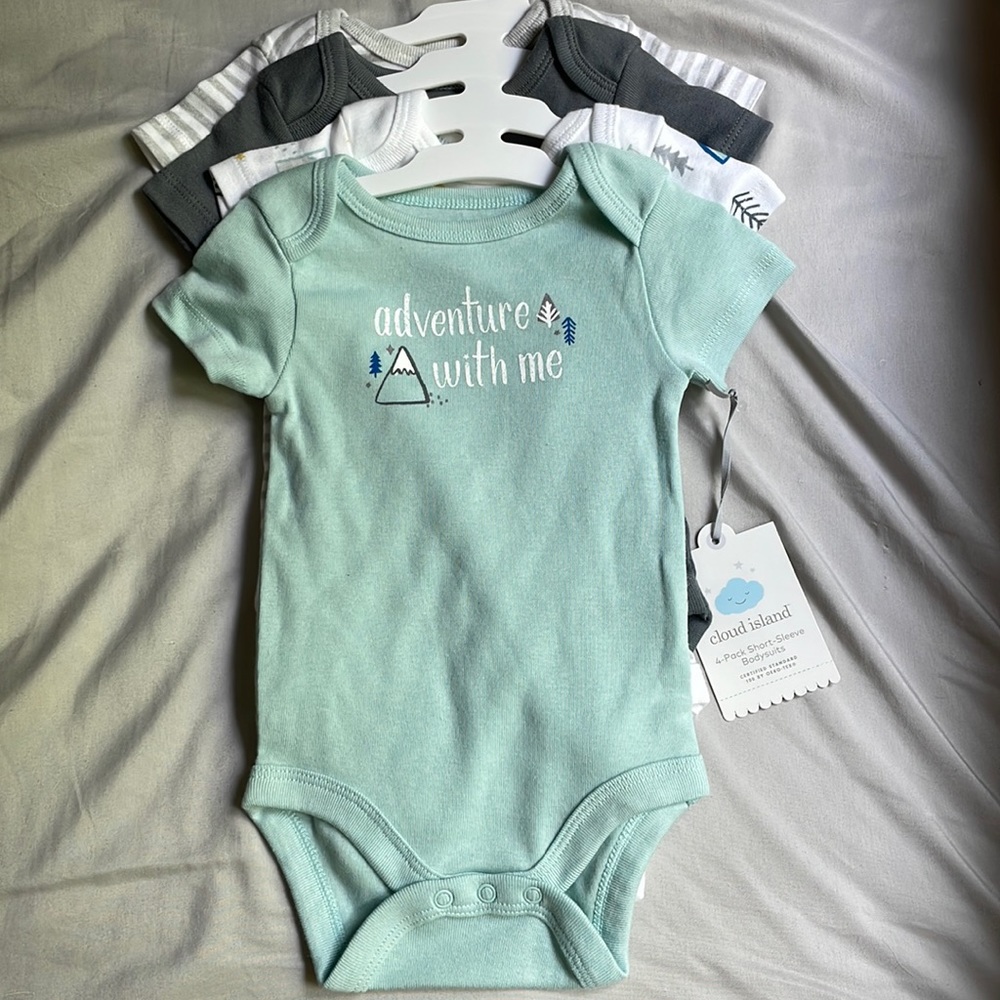 4 pack short sleeve bodysuits. 0-3 month
